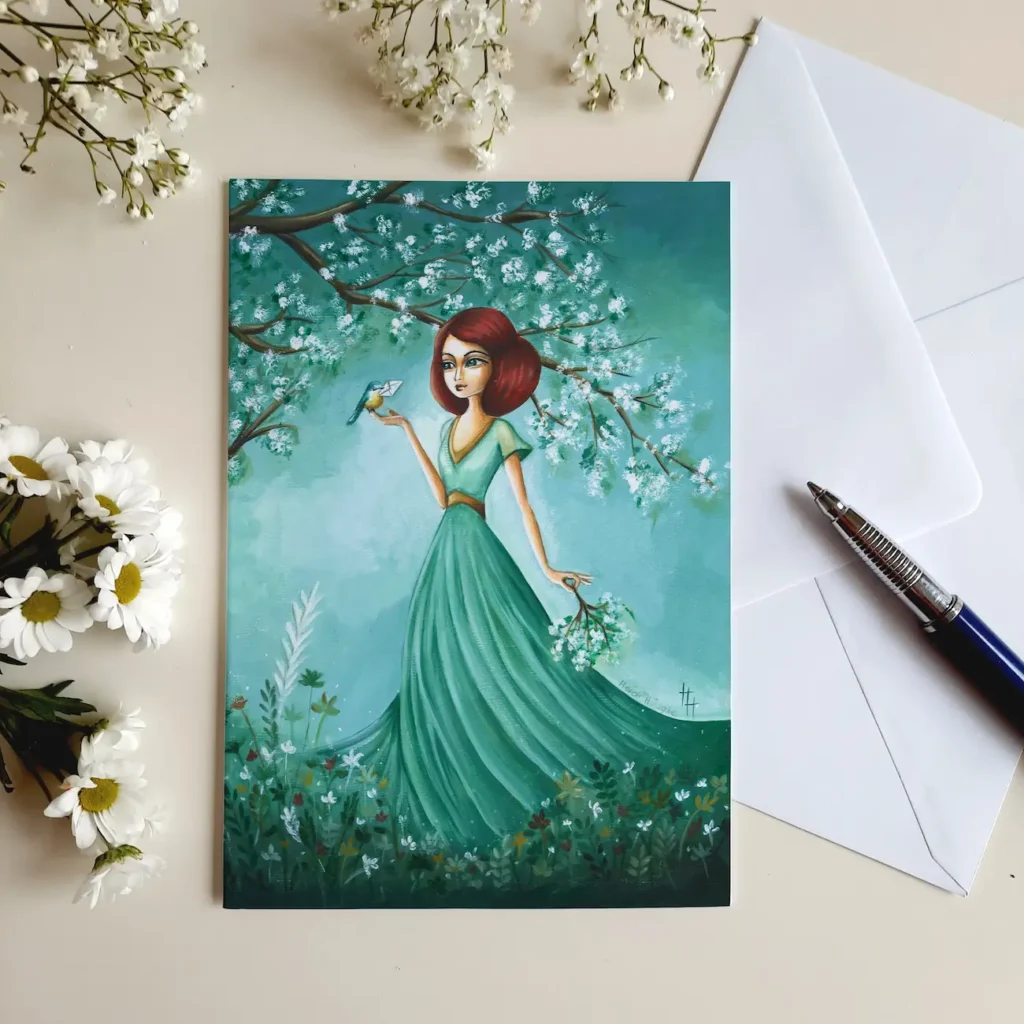 Wenskaart van meisje in bloemenveld met vogel met briefje inde bek op haar hand