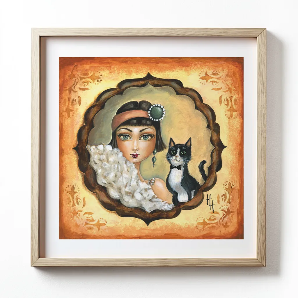 Framed portrait of a a lady all dressed up in twenties style together with her cat