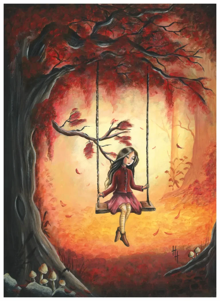 Girl sitting on a swing that is hanging from a red leaved tree