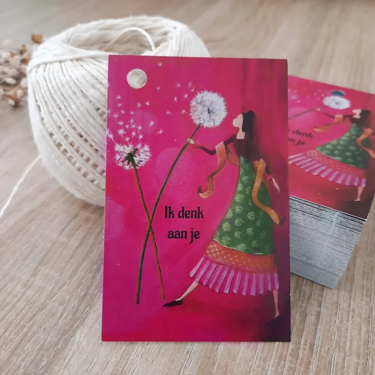 cadeaulabel met meisje die een grote paardebloem vasthoudt