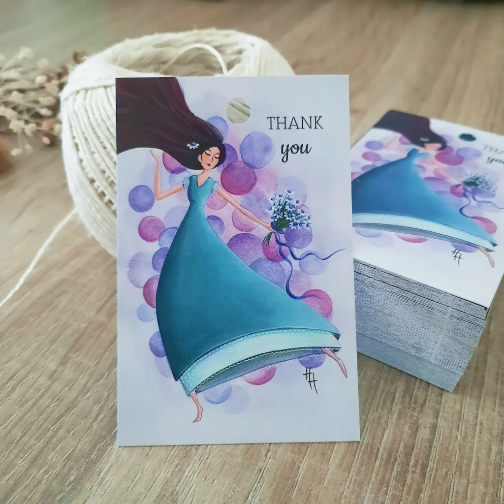 Thank you cadeaulabel van meisje met lange haren die een bleomenboeket vasthoudt