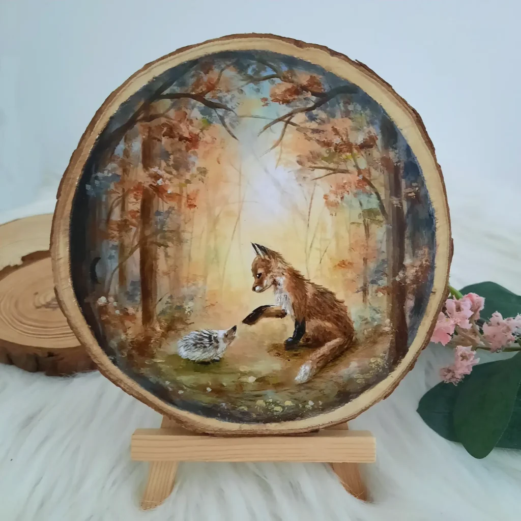 vosje met egeltje in een goud bruin bos